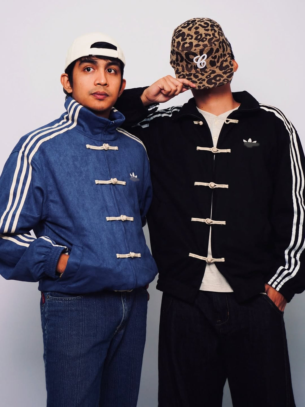 Blue and black Adidas Chinese New Year jacket couple set studio shot - Streetbred collection