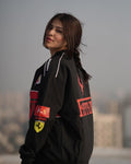 Oversized streetwear styling on a woman featuring the Streetbred Black Ferrari F1 Jacket and high-definition motorsport prints.