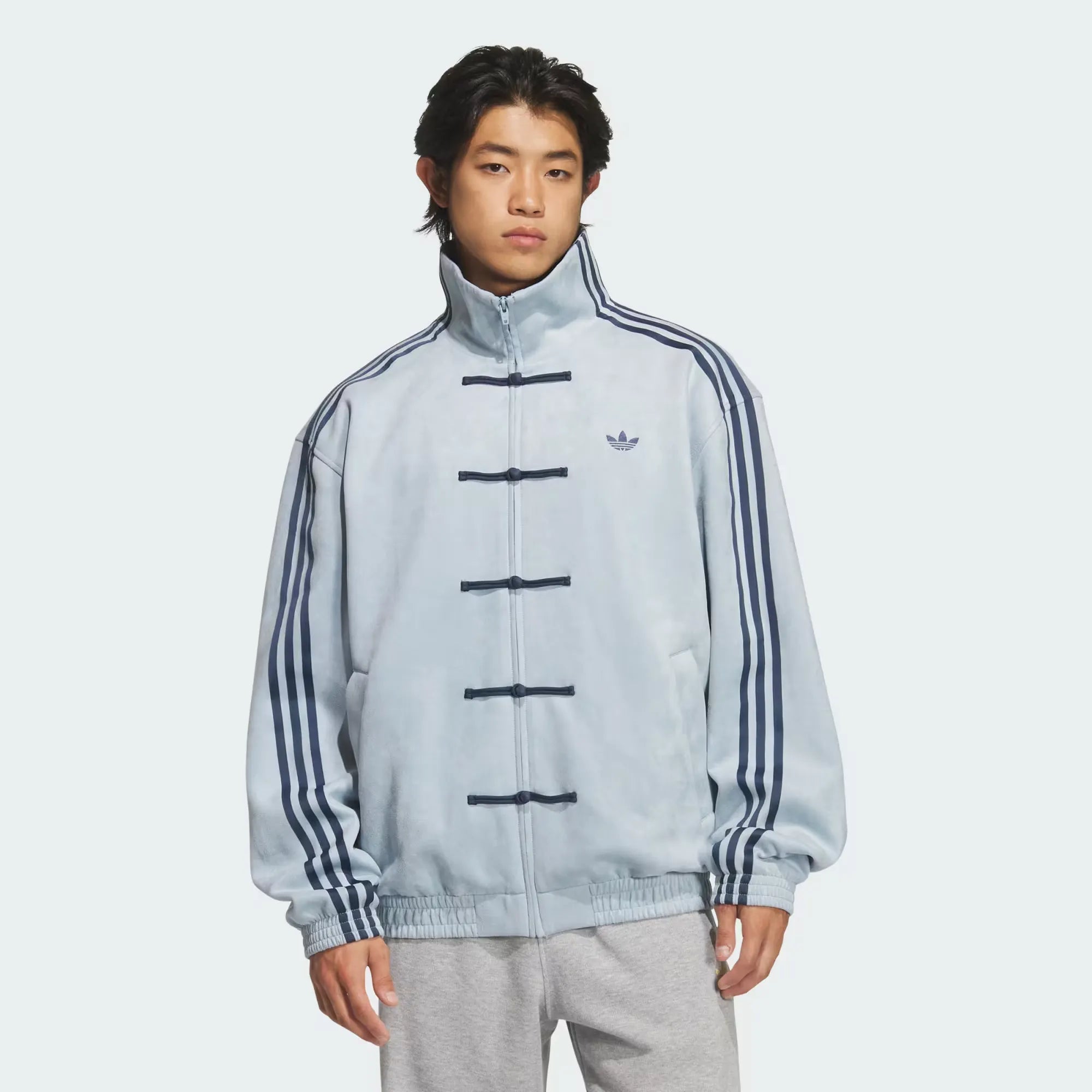 Close up of traditional frog-button knot closure on Adidas Chinese New Year jacket