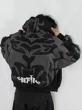 Close-up of White Multi-Layer Gothic DEPTH Logo on Black Fleece Hoodie