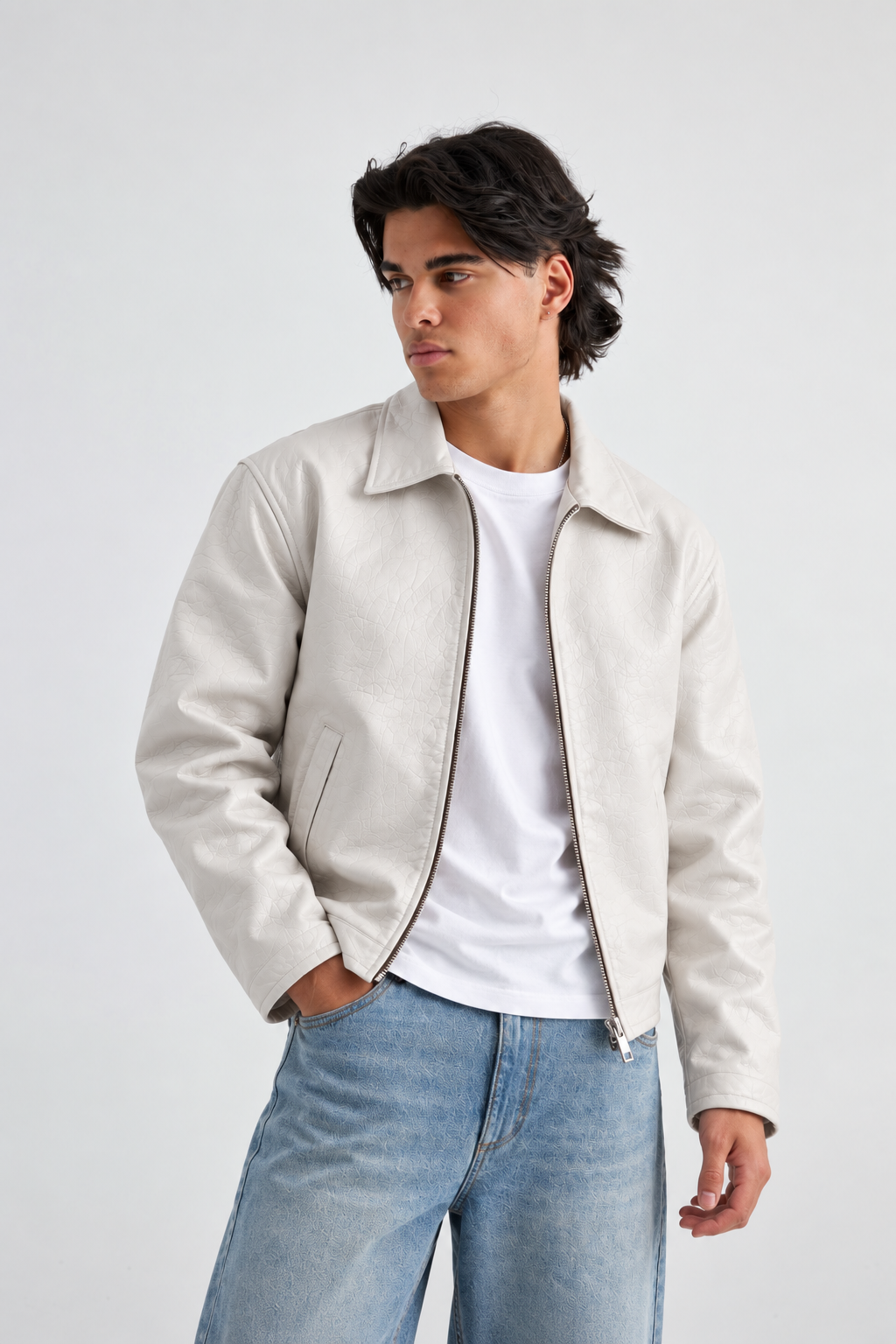 Close up of a boy styling the white retro collared streetwear jacket, focusing on the industrial front zipper and utility pouches