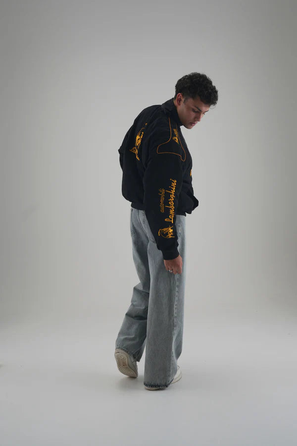 Lamborghini Text Embroidery on Right Sleeve with Orange Piping Detail
