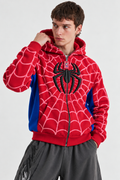 Front view of a male model wearing the classic Black Streetbred Spidey Zip-Up Hoodie, highlighting the stealthy streetwear aesthetic