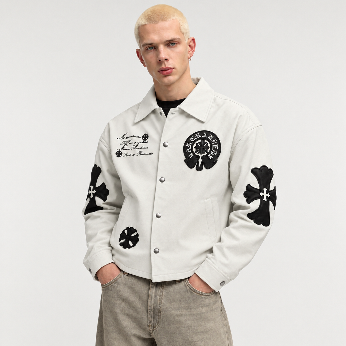 Male model wearing the off-white Gothic cross patch faux leather jacket from the front, showcasing the spread collar and structured Y2K boxy drape