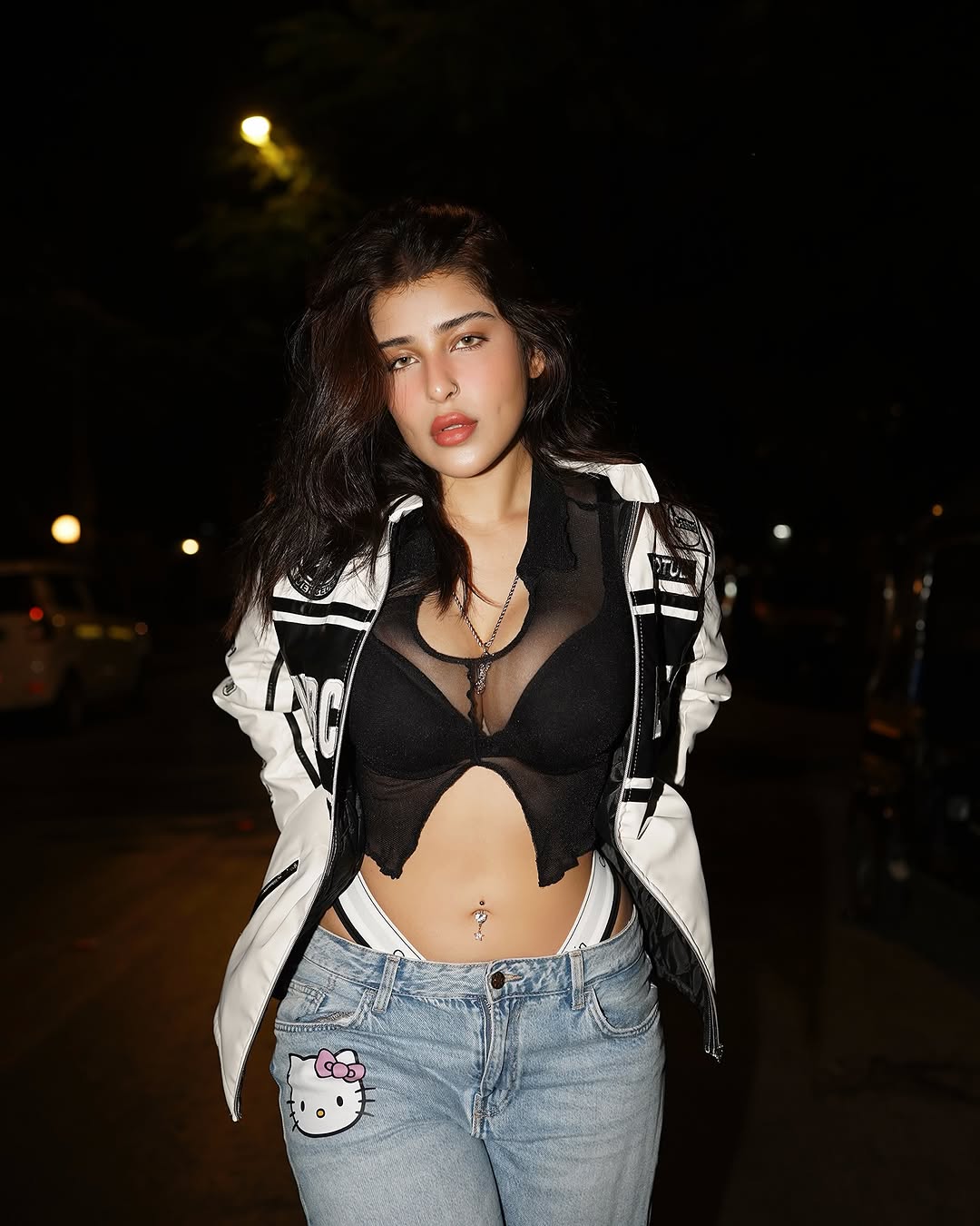 Close-up Mercedes Leather Jacket Texture and Embroidered Logo Print
