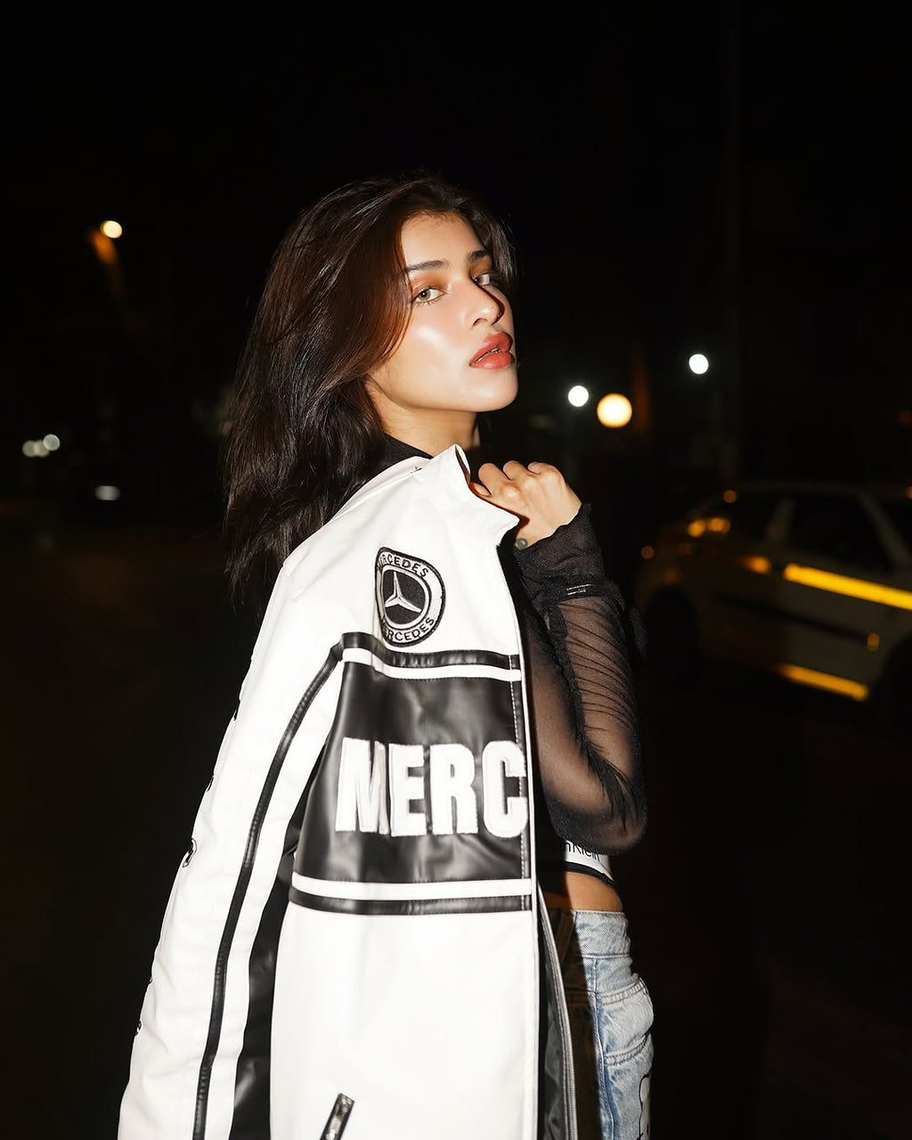 Styling the Mercedes Leather Racing Jacket - Female Model Lifestyle Pose
