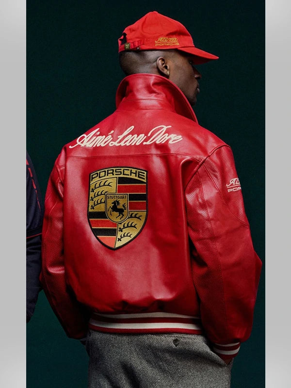Male model wearing the Streetbred Red Porsche 993 Leather Racing Jacket in a streetwear style