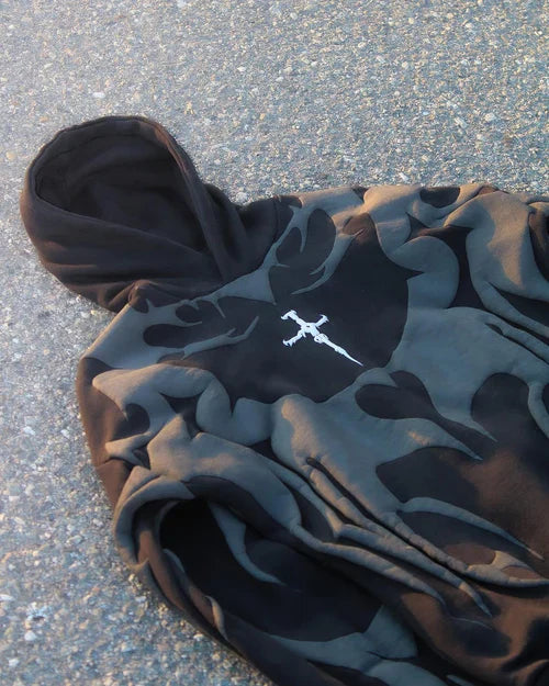 Front Flat Lay Tribal Shadow Hoodie Showing Grey Geometric Patterns and Chest Emblem
