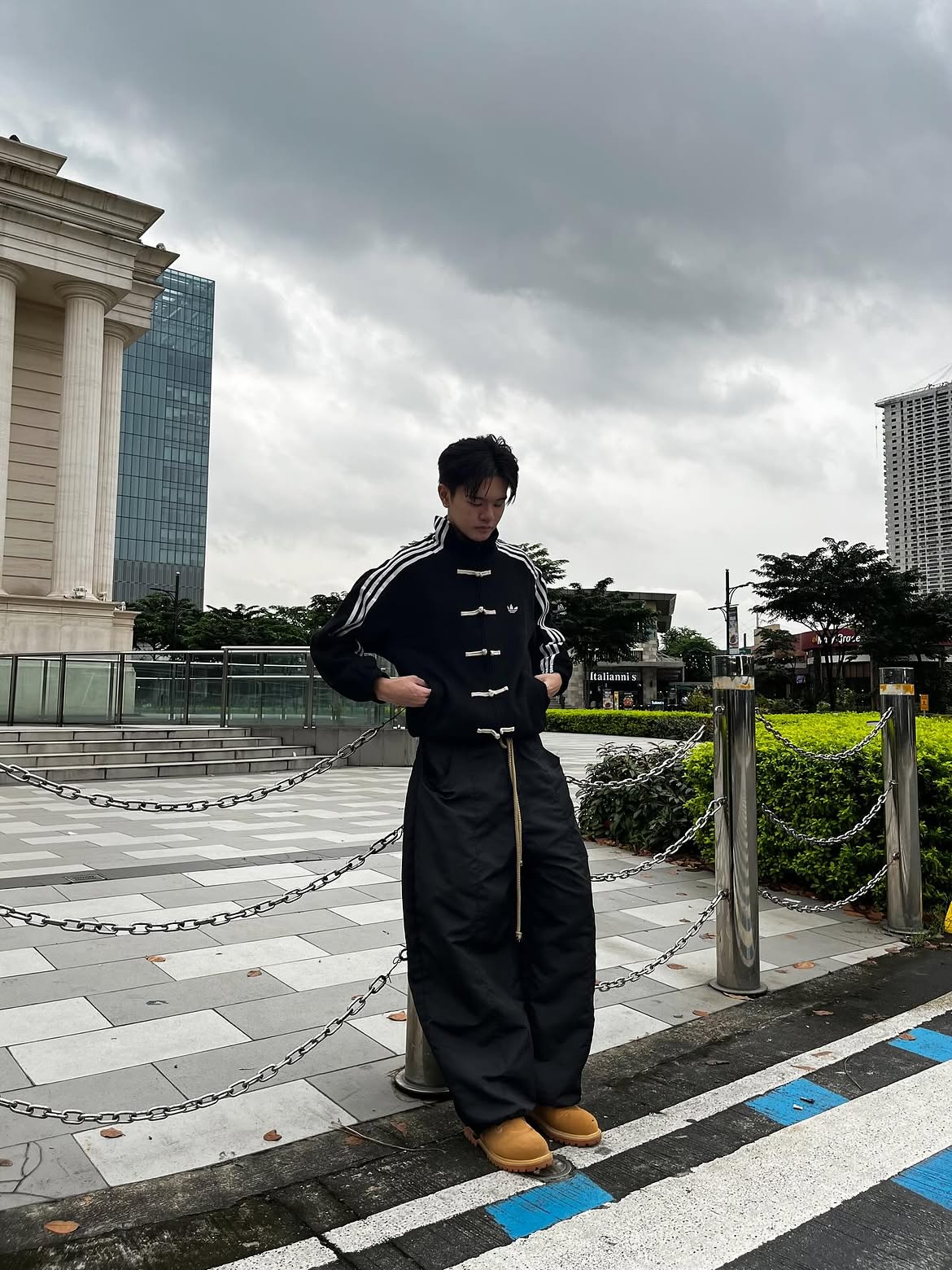 Male model showcasing the rich suede texture and vintage aesthetic of the Black Chinese New Year Jacket by Streetbred.
