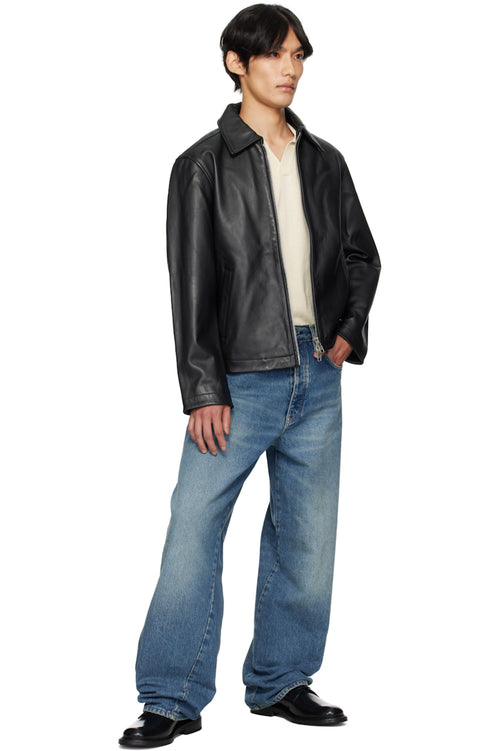 Male model showcasing the premium textured faux leather and heavy-duty front zipper of the Black Moto Biker Jacket