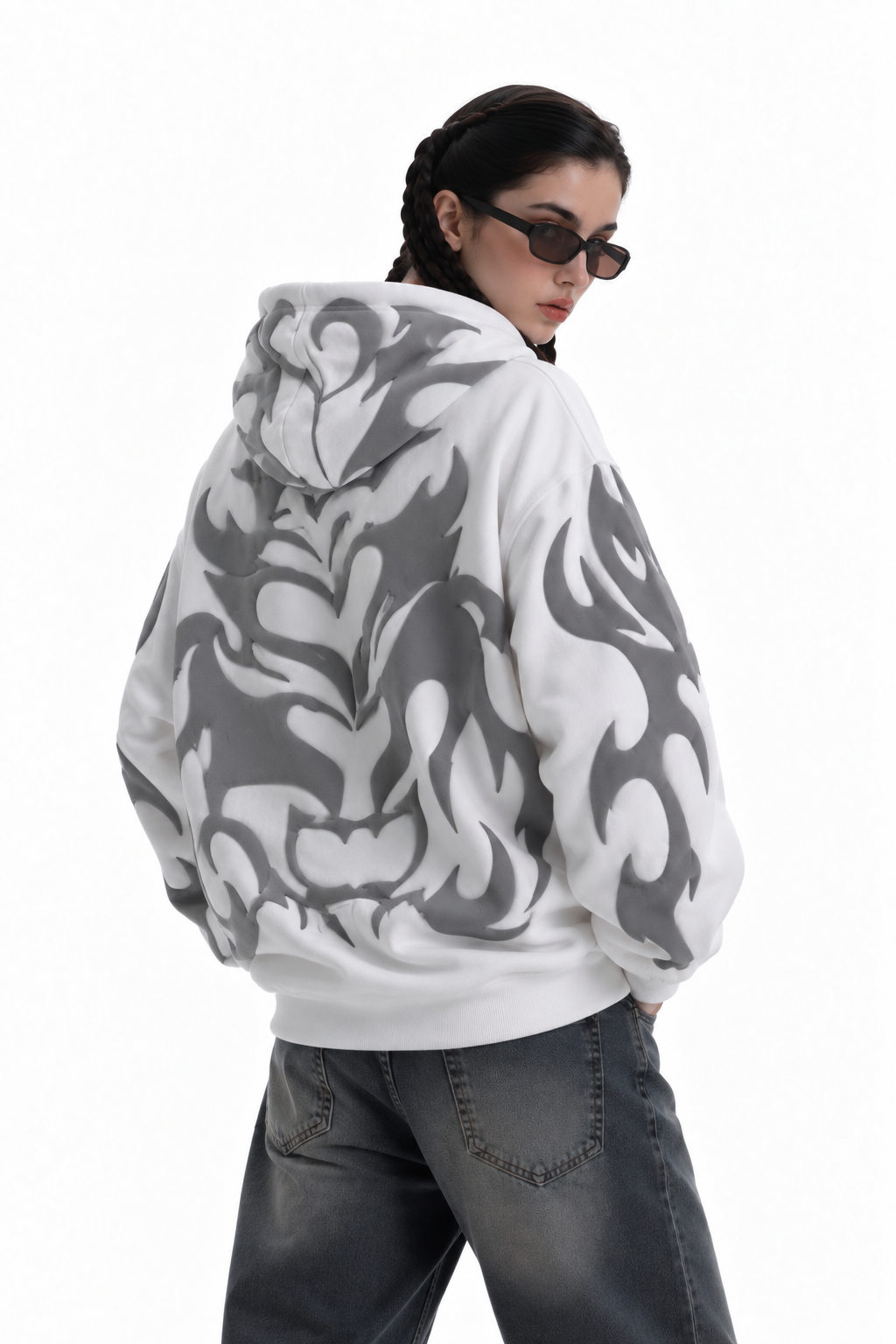 Back side shot of the white Depth hoodie, displaying the tactile tribal shadow 3D puff print on the 400 GSM fabric