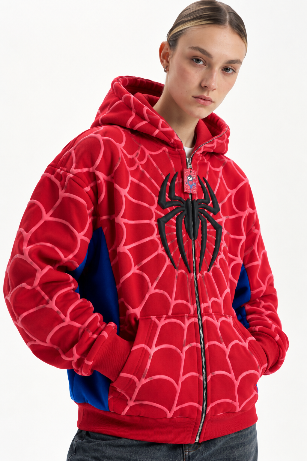 Female model wearing the oversized Black Spidey Zip-Up Hoodie, demonstrating the unisex appeal and comfortable streetwear fit