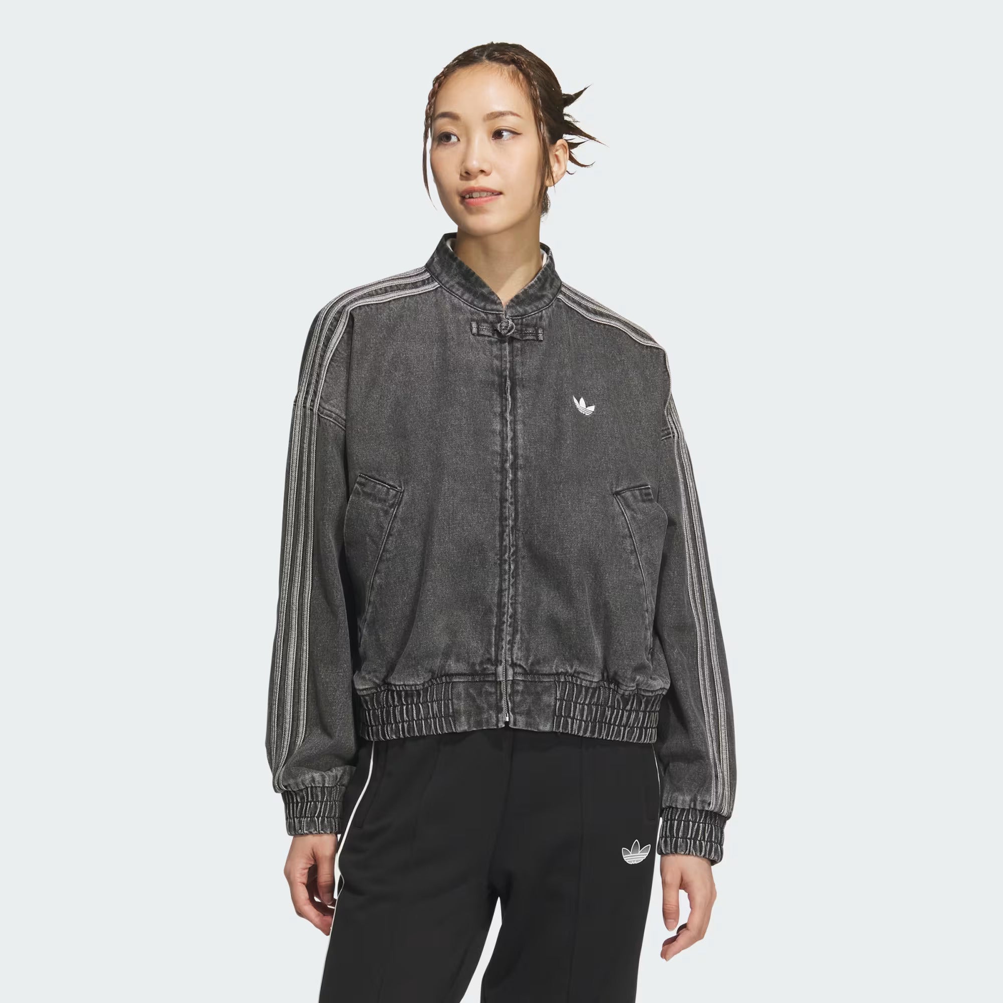 Women styling the oversized dark grey Denim CNY Jacket for a Y2K streetwear look